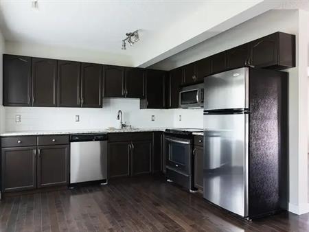 Inner City Townhome with Attached Single Car Garage | 213 Killarney Glen Court Southwest, Calgary