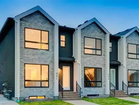 These 3 Storey Townhouses offer unique layouts for a 3 Bedroom 3.5 bathroom living environment | 553 20 Street Northwest, Cal