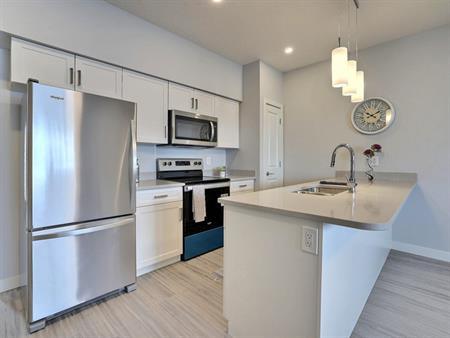 Green Brooks Townhomes | 5111 E Primrose Green Drive, Regina