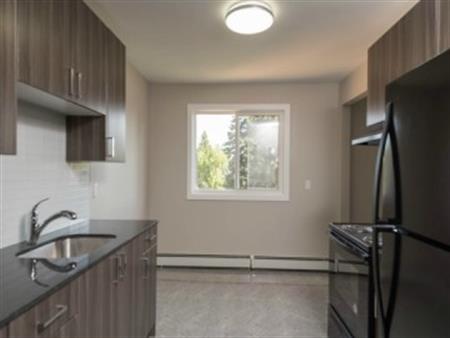 Lilac Manor | 10850 McQueen Road NW, Edmonton