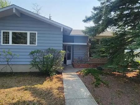 Large 6 Bedroom Home! Bungalow! Close to Schools & South Glenmore Park | 2015 Palliser Drive Southwest, Calgary