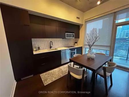 South-facing 2-bed at Victory Lofts! Huge 240sf balcony, top layout, parking + locker—steps to King West & TTC! | 478 King St