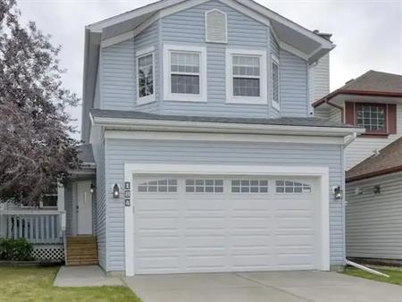 Charming Family Home in Serene Suburban Setting – Steps from Great-Rated School! | 184 Hidden Spring Close Northwest, Calgary