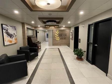 Condo locatif 4 1/2 sécuritaire avec ascenseur