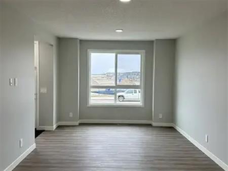 New Duplex with Office and Bonus room for rent in Belmont | Calgary