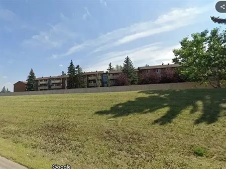 Bright & Spacious 2-Bedroom Condo in Prime Canyon Meadows Location | 11620 Elbow Drive Southwest, Calgary
