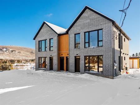 Votre havre de paix à Saint-Donat : 4 ½ moderne avec 2 salles de bain - Promo 3 mois gratuits sur bail de 24 mois.