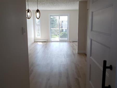 Magog... superbe 5 1/2 style condo