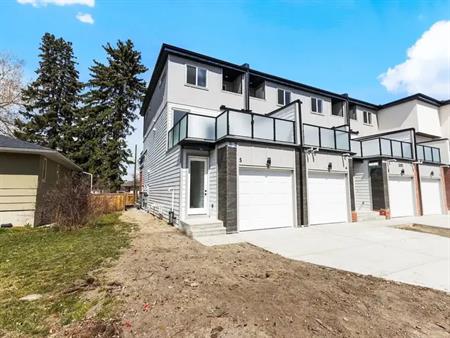 The Patio Residences: 2 Bedroom + Den Townhomes w/ Attached Garage Banff Trail | 5 - 2202 25 Avenue Northwest, Calgary
