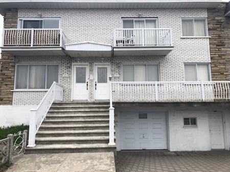 St-Léonard, grand 61/2 à louer 1er étage, cours sous-sol et garage double près de tous les services