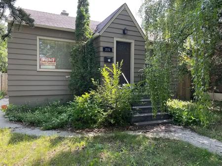 Cozy Bungalow with (2 + 1) in Cres. Hts - Large Fenced Backyard - Small pets OK | 215 13 Avenue Northeast, Calgary
