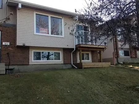 Renovated, 3 bedrooms, 2 baths, balcony, vinyl windows. | 155 Berwick Drive Northwest, Calgary