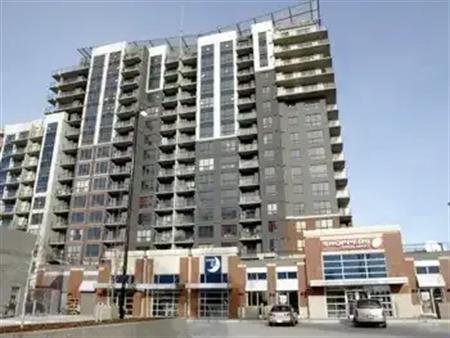 Large 1 BR + Den, Heated Parking Condo at London @ Heritage | 214 - 8710 Horton Rd SW, Calgary