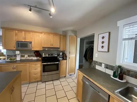 ELBOYA THREE BEDROOM MAIN FLOOR -GARAGE | 4715 stanley road, Calgary