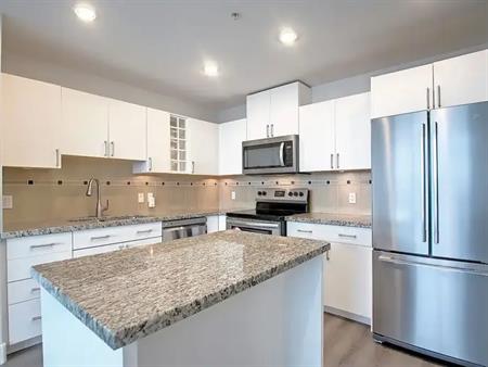 Two bedroom condo minutes from downtown (Westbrook LRT) | 77 Spruce Pl SW, Calgary