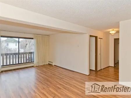 Sunalta: 2 Bedrooms - 1,050 Square Feet - 1 Block To 17 Ave - Cats Welcome | 1512 16th Ave SW, Calgary