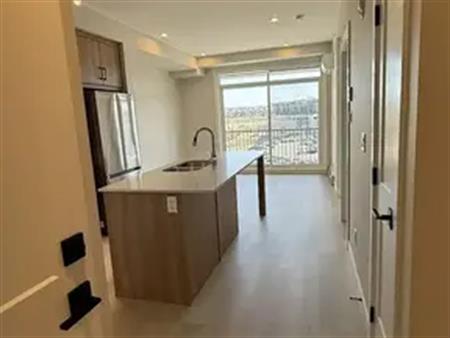 BRAND NEW SOUTH FACING TOP FLOOR 2 BED 1 BATH APARTMENT | 416 - 70 Sage Hill Walk Northwest, Calgary