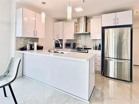 Condo avec garage et électroménagers, 2 chambres, 2 salles de bain – Cité Centrale, Saint-Léonard