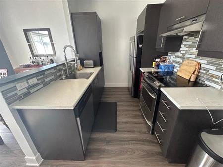 Très beau condo