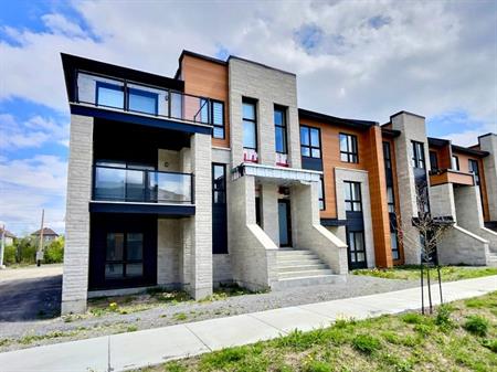 Condo 4 ½ Gare Ste-Rose Laval – 2 chambres, 2 salles de bain – 1 302 pi² – Garage inclus