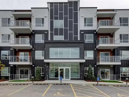 Brand New, Spacious 2 Bed/2 Bath Corner Condo with Underground Parking (EV) | 4305 - 550 Belmont Street Southwest, Calgary