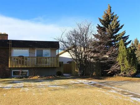 Bi-Level Duplex in West Dalhousie with 4 Bedrooms | 6535 58 Street Northwest, Calgary