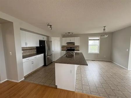 Spacious main + upstairs with great city and mountain views | Calgary