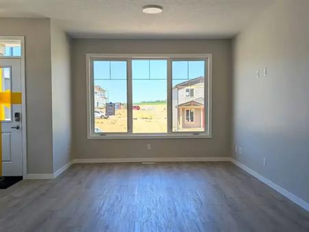 Bright and Modern 4-Bed 3-Bath + Bonus Room Home in Livingston | Calgary