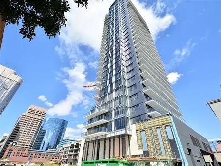 FULLY FURNISHED 2 Bedroom w/ Underground Parking & Storage! | 404 - 1010 6th St SW, Calgary