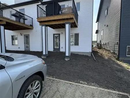 Bright Walkout Suite Across Future Green Space, Separate Entrance | 110 Edith Green Northwest, Calgary