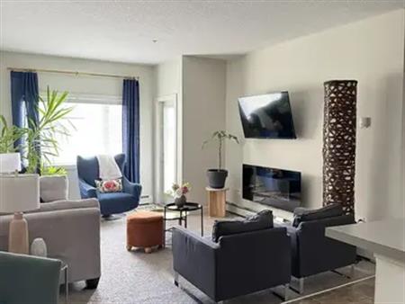 Bright Ground-Floor Gem with Courtyard Access | 23 Millrise Drive Southwest, Calgary