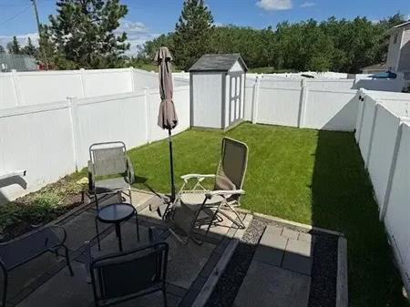 Charming Furnished 3-Bedroom Townhouse in Woodbine, Near Fish Creek Park | 183 Woodsman Lane Southwest, Calgary