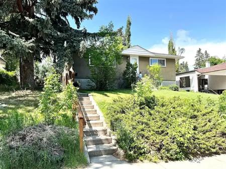 Raised Bungalow Basement Suite - Natural Lighting - Separate Laundry | 5415 Buckthorn Road Northwest, Calgary