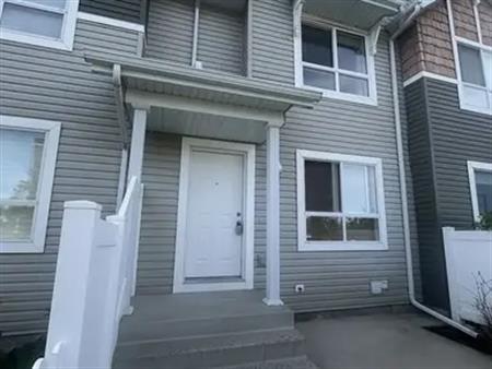 Tuscany Townhouse with Double Garage & Mountain Views! | Calgary