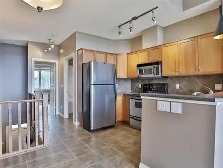 Mount views, 2 bedroom, 2 bath condo with 2 underground heating stalls. | 16 - 145 Rockyledge View Northwest, Calgary