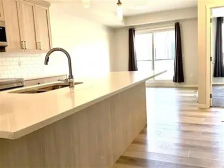 Modern 1 bedroom 1 bathroom condo with in-suite laundry | 2201 - 42 Cranbrook Gardens Southeast, Calgary