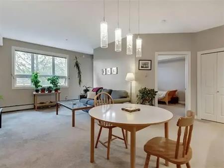 Main Floor 1 Bedroom Condo in West Springs | Corner Unit | Underground Parking | 350 - 26 Val Gardena View SW, Calgary