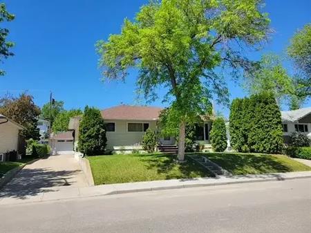 5 rooms Full house, lodge style basement,heated garage,long driveway for trailer | Calgary