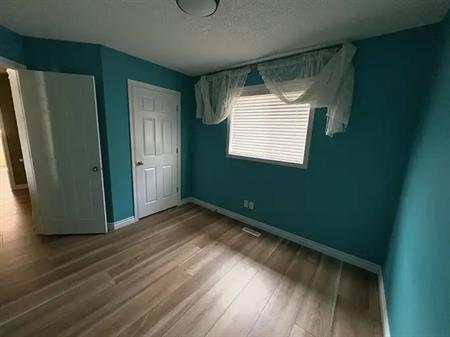 Cozy, Budget-Friendly Room | 158 New Brighton Lane Southeast, Calgary