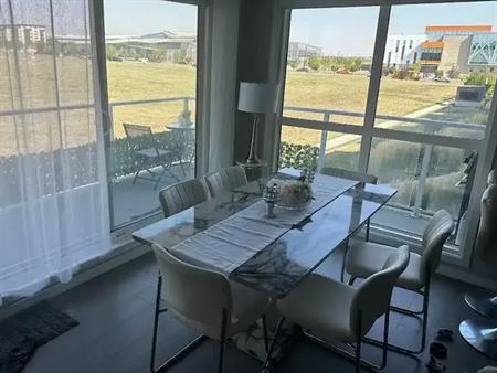 2 bedroom 2 bathroom unit on 2nd floor Backing on to the park 914 sqft | 209 - 4350 Seton Dr SE, Calgary