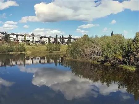 Beautiful Executive Home backing onto Birch Pond - Walkout | Calgary