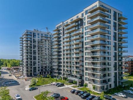 Condo 3 1/2 de luxe 2025 à louer Centre-ville de Laval - 1 chambre
