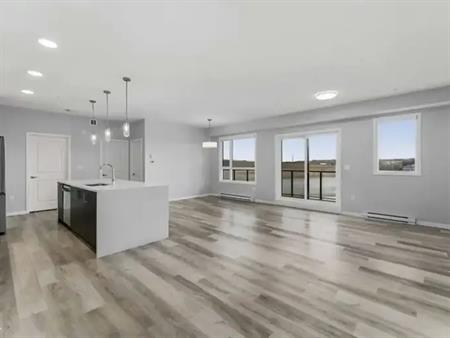 RIVERSTONE MANOR- LUXURY APARTMENT | 2209 - 42 Cranbrook Gardens Southeast, Calgary