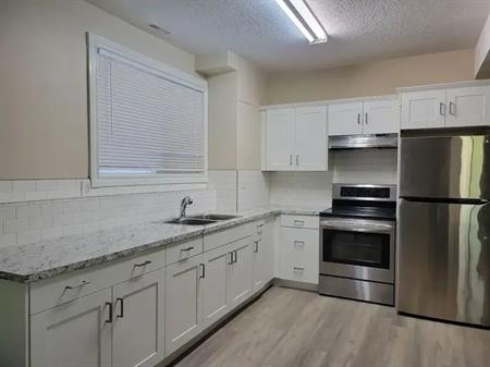 Partially renovated 4Plex Unit in a great location! | C - 421 13 Avenue Northeast, Calgary