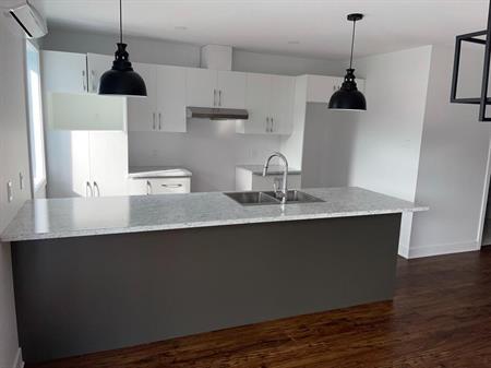 condo 5 1/2 a louer