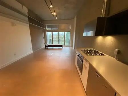 Major WOW Factor! Stunning Concrete Loft w/ Views & Lavish Kitchen! | 1529 West 6th Avenue, Vancouver
