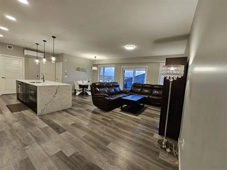 Spacious & Luxurious 1,122 sq ft Corner Unit with Mountain Views & A/C | 3305 - 33 Carringham Gate Northwest, Calgary