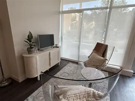 Bright furnished 1brm condo in Hillhurst/Sunnyside with large private patio | 1107 Gladstone Road Northwest, Calgary