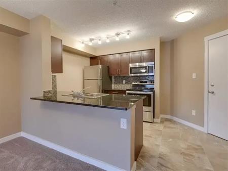 Executive 1-bed plus den, 1-bath condo with heated underground parking | 18126 77 St NW, Edmonton