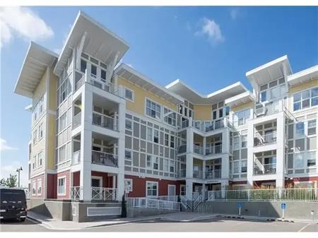 1 bed plus den with 1 above ground assigned parking spot, lake access | Calgary